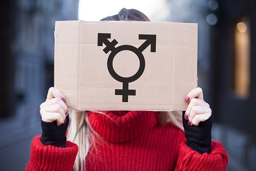 The,Symbol,Of,The,Transgender,In,Hands,On,A,Cardboard